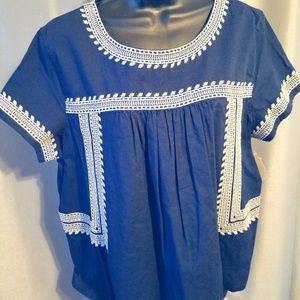 Falls Creek Navy blue top with white embroidery.